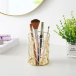 Makeup brush holder with brush inside it