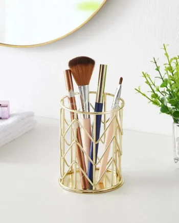 Makeup brush holder with brush inside it