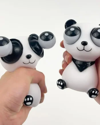 two squeeze panda toys in hand