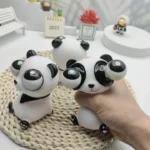 three squeeze panda toys