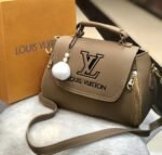 Louis Vuitton Sand Brown Colour Bag with pom-pom