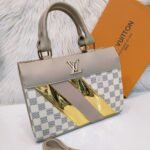 Louis Vuitton Peach and White colour Bag