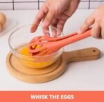 Beating egg with of Pasta spoon with egg beater